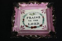 A Sunderland lustreware wall plaque inscribed: Praise Ye The Lord. H.21 W.23cm.