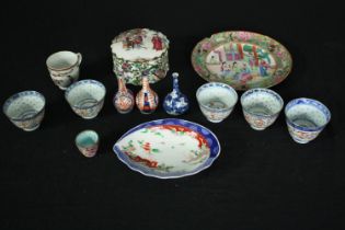 A mixed collection of Japanese and Chinese porcelain to include a 19th century Famille Rose lidded