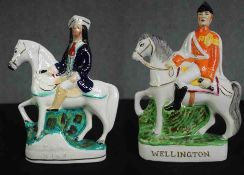 Two 19th century Staffordshire figures, Wellington and Tom King. H.23cm.