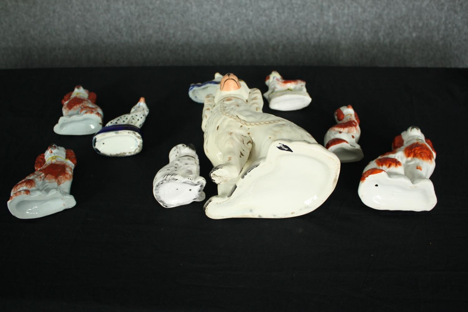 A collection of nine 19th century Staffordshire dogs. H.25cm. (largest) - Image 8 of 8