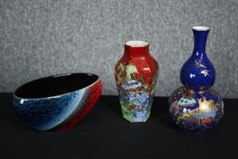 Two Oriental style vases and an art pottery bowl. H.21cm. (largest).