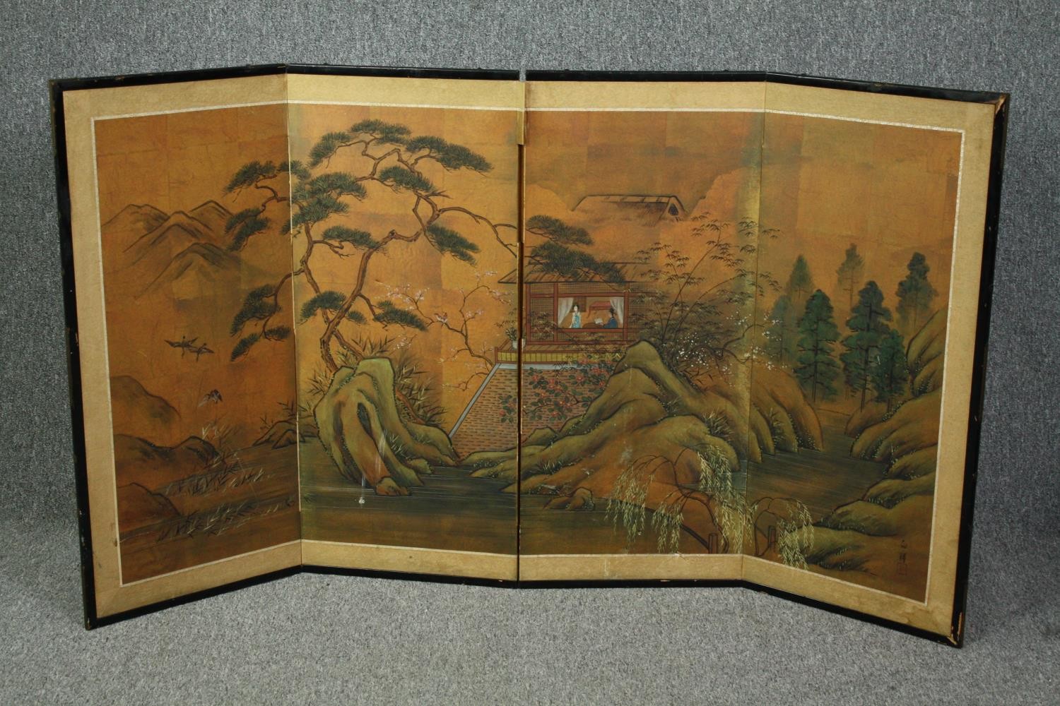 An early 20th century Japanese low screen with four gouache painted panels on a gilt background. H.