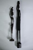 Two carved African hardwood figures. H.35cm. (largest).