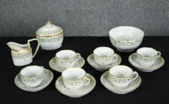 Tea service, Coalport, C.1800, hand painted to include six cups and saucers, two bowls and a cream