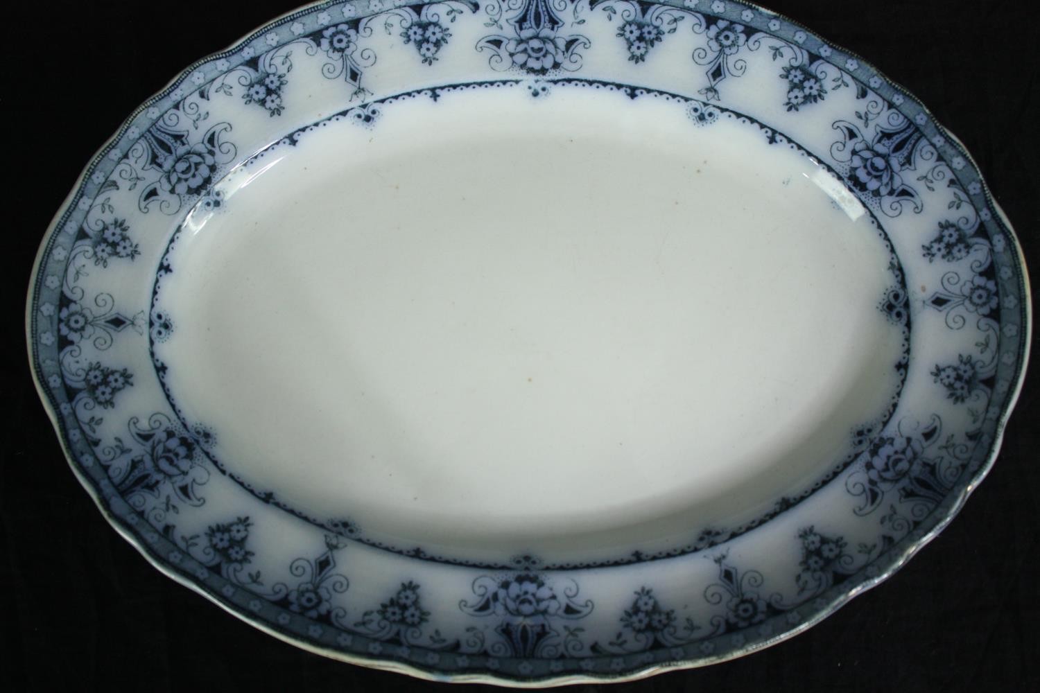 A 19th century blue and white part dinner service. H.33 W.24cm. (largest) - Image 5 of 9