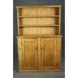 Kitchen dresser, 19th century pine with fixed upper section. H.187 W.127 D.42cm.