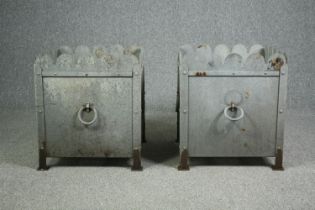 A large pair of early 20th century galvanised metal and painted garden planters. H.62 W.54 D.