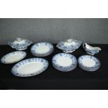 A 19th century blue and white part dinner service. H.33 W.24cm. (largest)