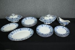 A 19th century blue and white part dinner service. H.33 W.24cm. (largest)