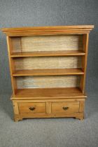 Side cabinet, made from 19th century pine in two sections. H.141 W.132 D.33cm.