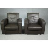 A pair of contemporary leather upholstered armchairs by Bo concept. H.83 W.83 D.80cm. (each).