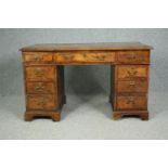 A 19th century burr walnut pedestal desk of compact size in the Georgian style. (Comes in three