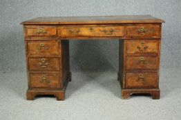 A 19th century burr walnut pedestal desk of compact size in the Georgian style. (Comes in three