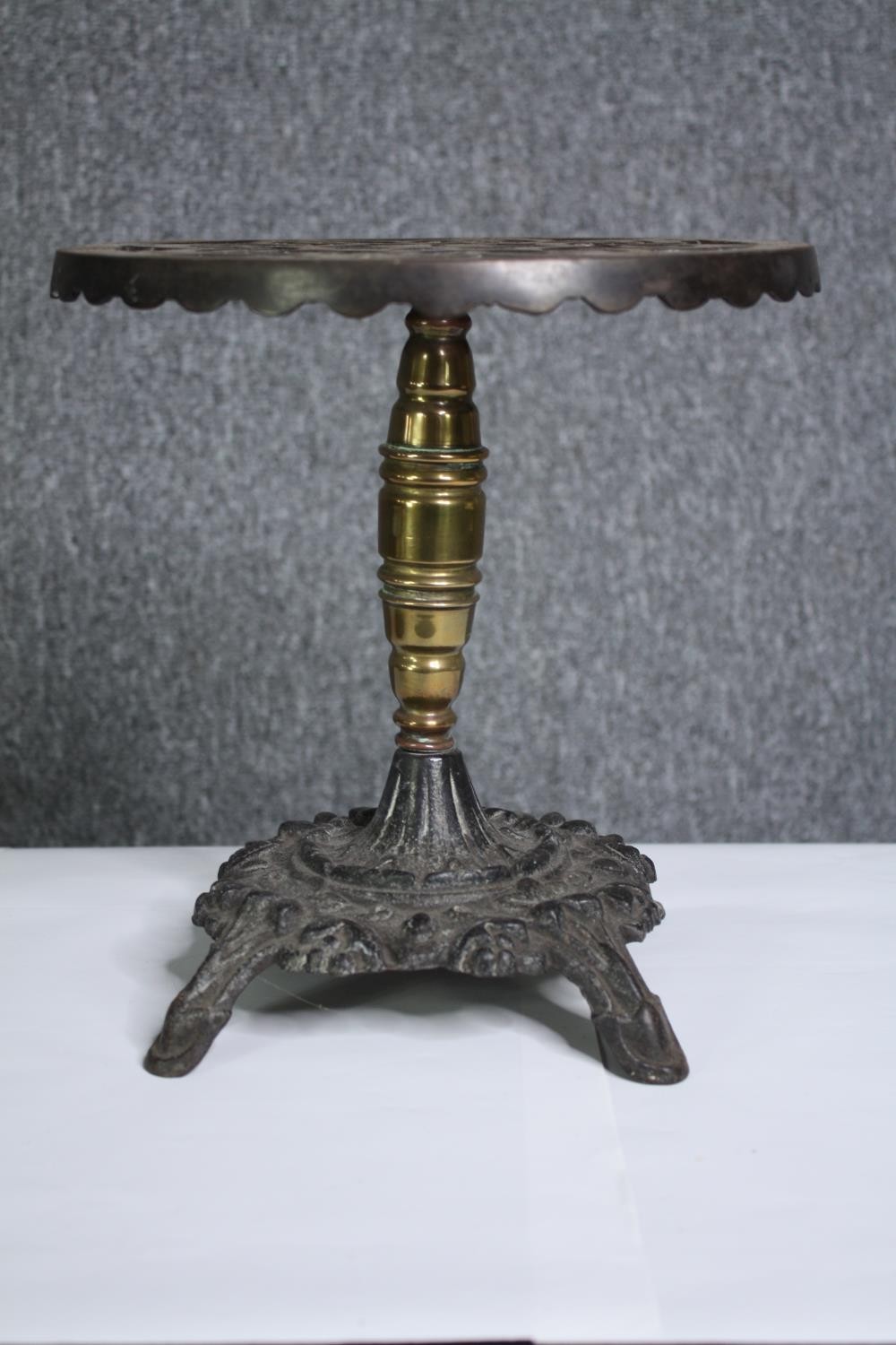 A 19th century brass and iron trivet in the form of a table and an embossed dish. H.26 Dia.26cm. ( - Image 3 of 5