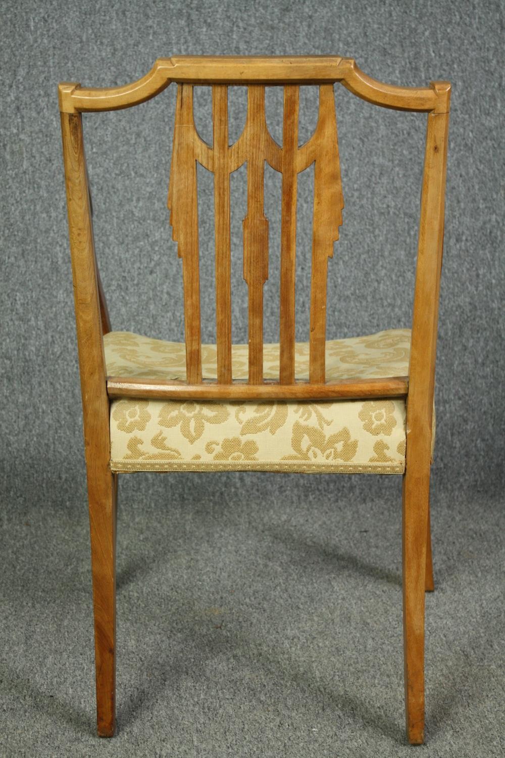 A set of eight Georgian style birch dining chairs to include two carver armchairs. (Repairs to the - Image 6 of 12