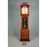 A Georgian style mahogany longcase clock with moonphase and steel and brass engraved face. H.212 W.