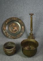 A brass ecclesiastic style candlestick along with two metal pots and a tray. H.71cm. (largest).