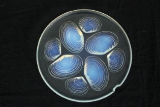 A blue glass dish, Coquilles, Sabino Paris. Dia.16.5cm. (Chipped as seen).