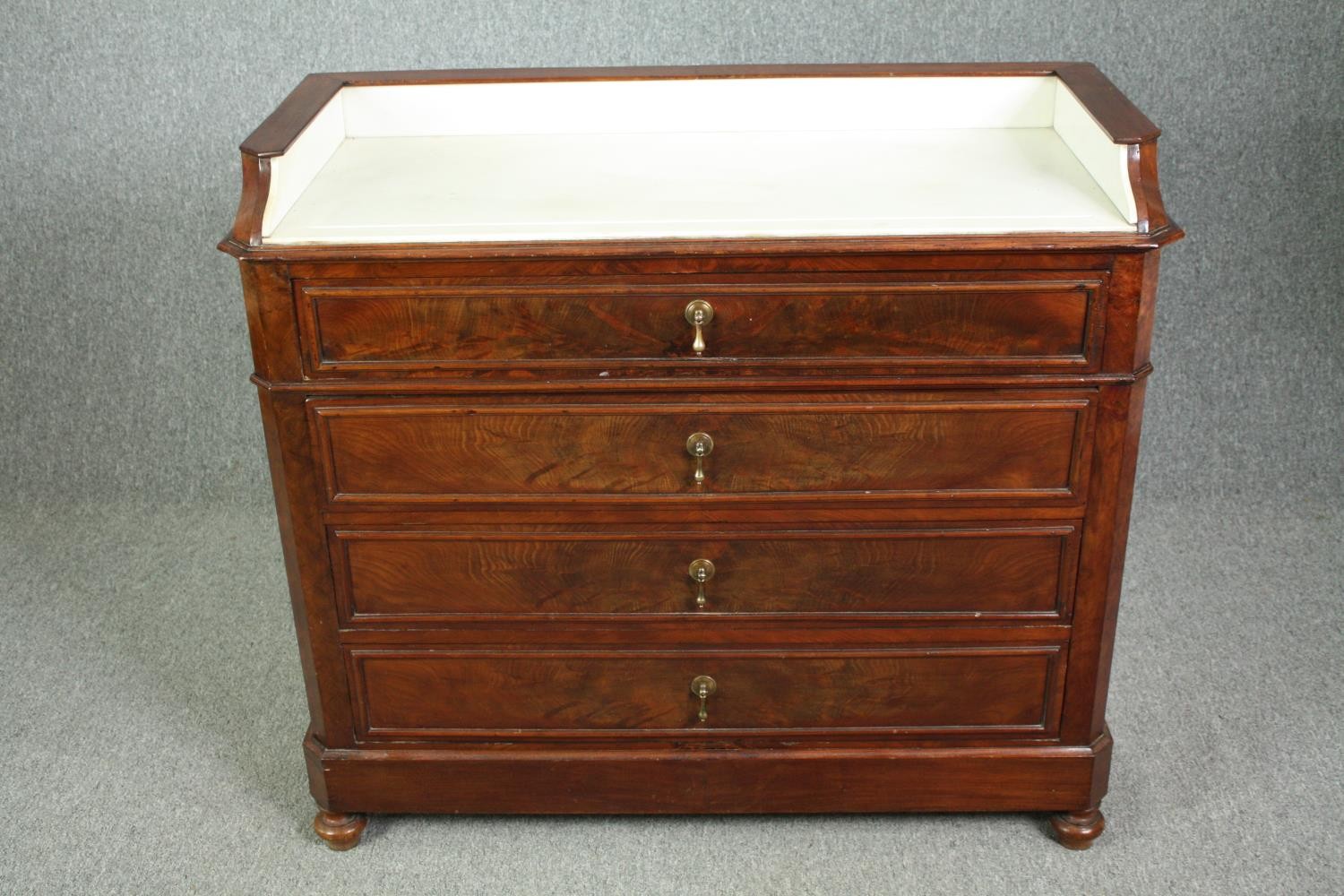 Washstand, late 19th century French flame mahogany with marble inset top. H.98 W.107 D.50cm.