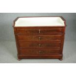 Washstand, late 19th century French flame mahogany with marble inset top. H.98 W.107 D.50cm.