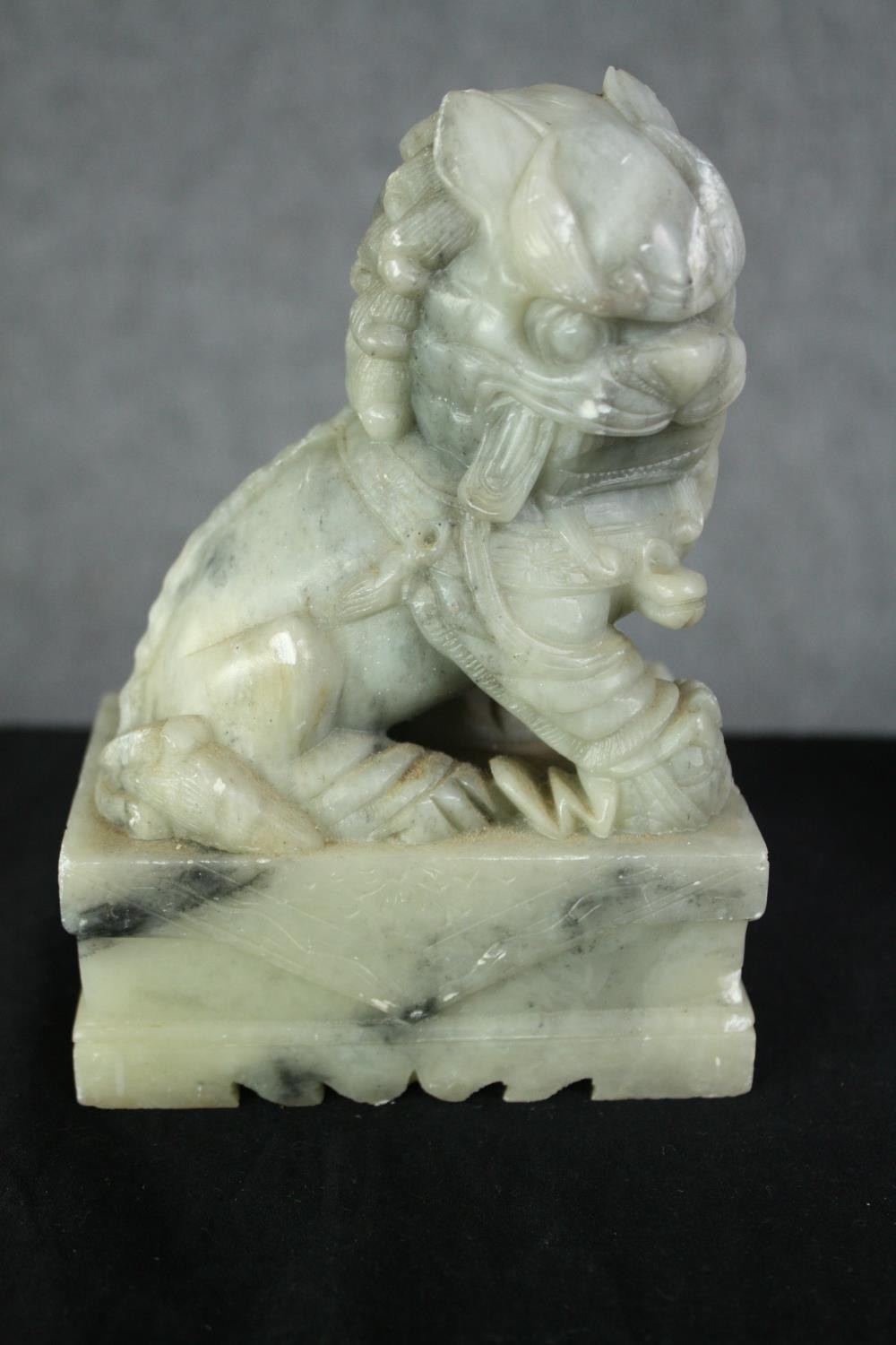 A pair of Chinese carved soapstone foo dogs. H.14cm. (each). - Image 3 of 6