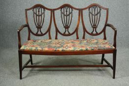 Bench sofa, Georgian style mahogany with triple Hepplewhite shield back. H.102 W.135 D.48cm.