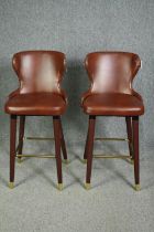 A pair of leather upholstered vintage style high stools. H.102cm. (each).