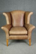 Wingback armchair, Georgian style leather upholstered. (Looks unused and is XL) H.119 W.113 D.100cm.