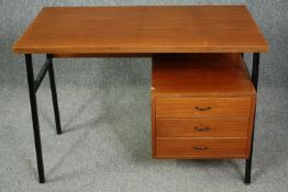 A mid century vintage teak and metal framed desk. H.72 W.99 D.52cm.