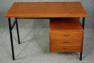 A mid century vintage teak and metal framed desk. H.72 W.99 D.52cm.