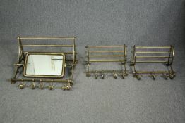 A pair of vintage style train compartment luggage racks along with a larger example fitted with