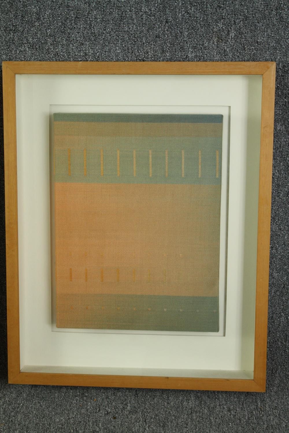 A set of three contemporary framed and glazed abstract fabric artworks. H.61 W.49cm. (each). - Image 6 of 8