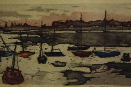 A framed and glazed limited edition etching, sailing boats in an estuary, numbered and