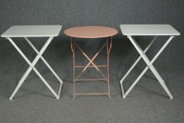 A pair of folding metal tables and another similar. H.73 W.60 D.55cm. (largest).