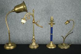 A miscellaneous collection of four brass table lamps to include a desk lamp with articulated