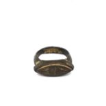 A bronze Roman ring with elliptical shape and hand etched geometric design. Ring size P. Weight 8.