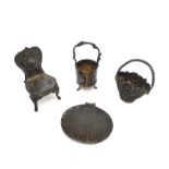 Three silver miniatures to include a repousse chair by John George Piddington, a white metal