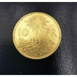 A 1922 Swiss 10 Franc gold coin, diameter 1.9cm Weight 3.21g.