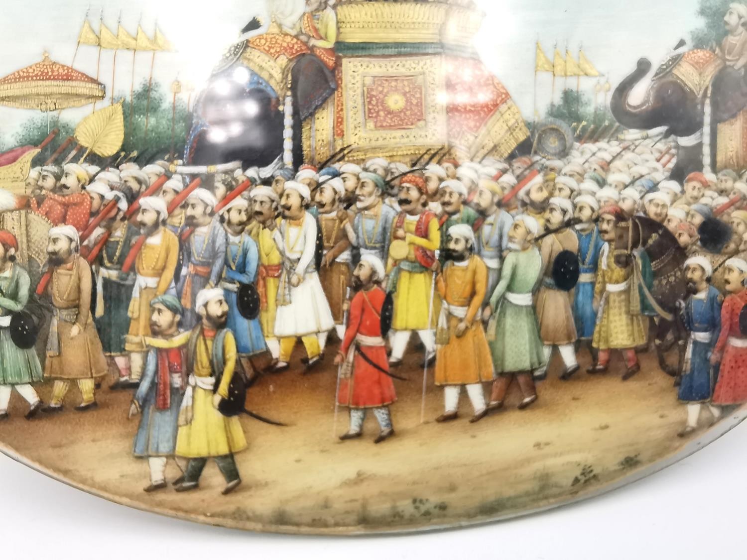 A 19th century Indian Mughal oval miniature on ivory of a royal procession, Akbar Shah II on - Image 5 of 8