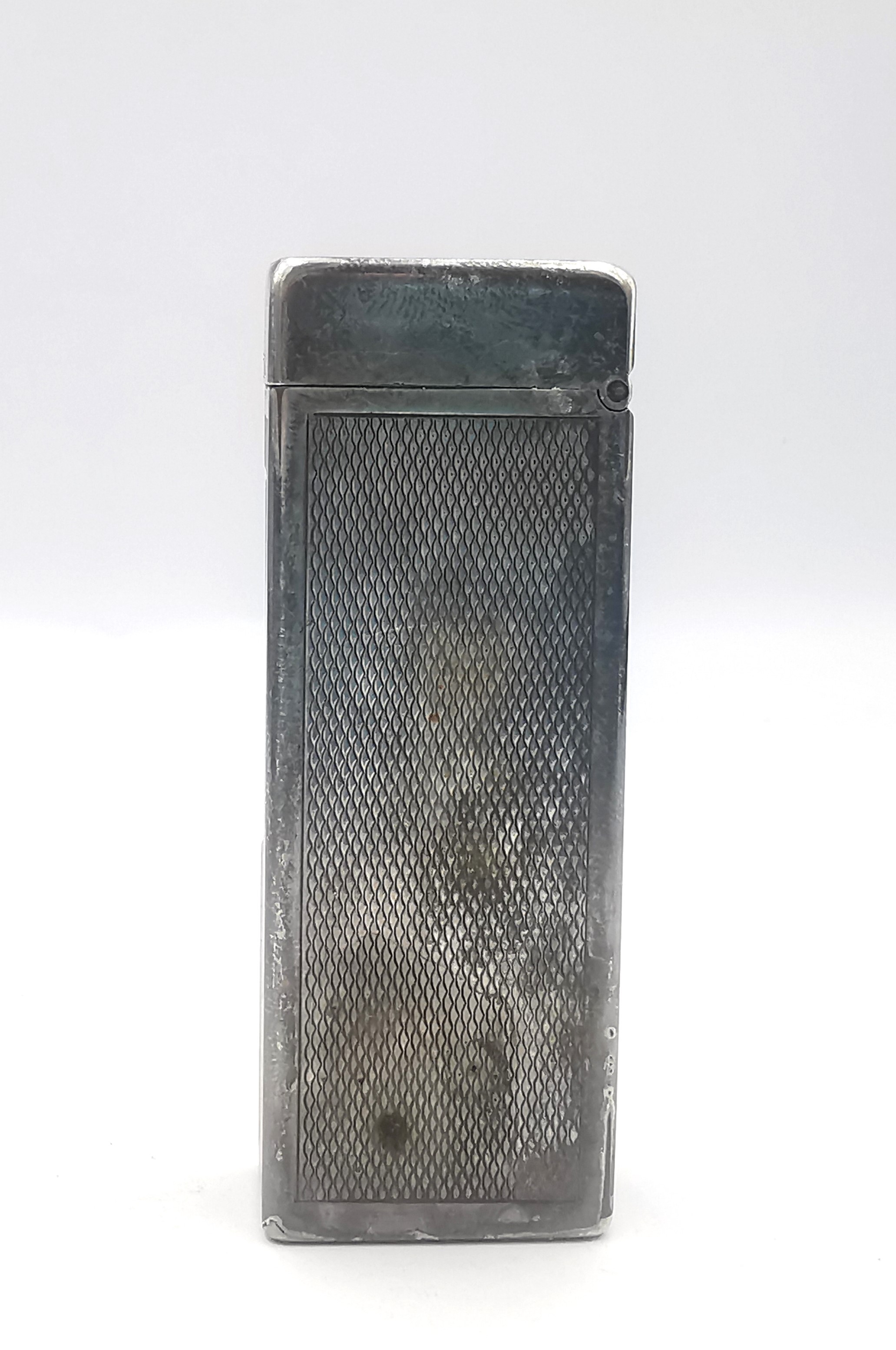 A cased silver Dunhill lighter, marked Made in Switzerland, Dunhill, London with patent LIC USA - Image 6 of 11