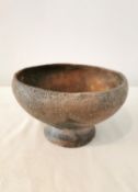 A Pre-Colombian terracotta footed bowl. H.11.5 Diameter 19cm.