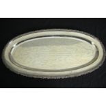 A large 19th century Russian Buntzelb 800 silver oval platter with scalloped edge, signed all over