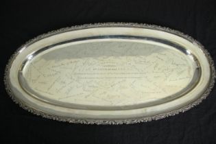A large 19th century Russian Buntzelb 800 silver oval platter with scalloped edge, signed all over