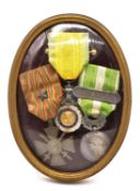Three framed and glazed French war medals: Troisième République, Valeur et Discipline, Medal,