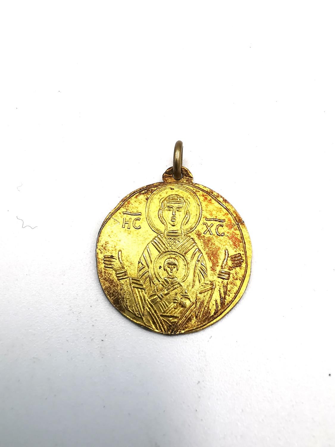 Two yellow metal st Christopher's, one Greek yellow metal (tests as 18ct) depicting Mary and Jesus - Image 3 of 6