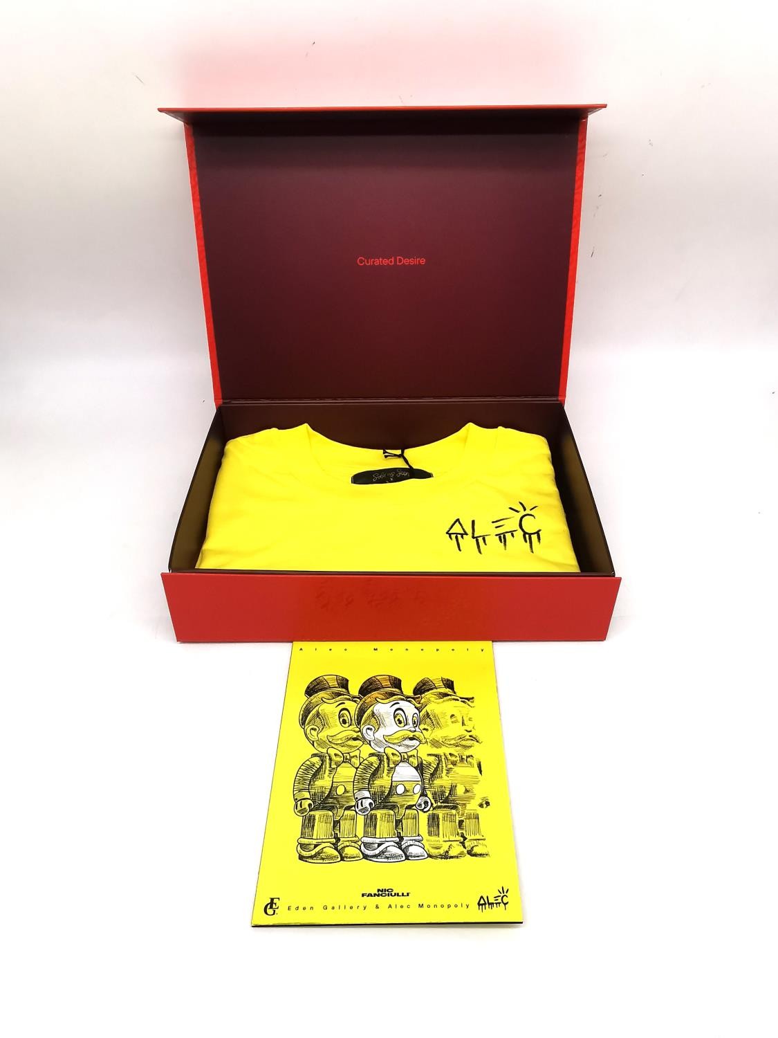 'Sold as Seen' signed T-shirt by the artist 'Alec Monopoly' size XS, measures 105cm from where the