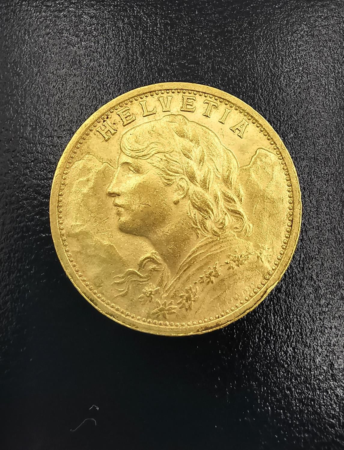 A 20F Swiss gold coin dated dated 1898. Diameter 2.1cm. Weight 6.44g. - Image 2 of 3