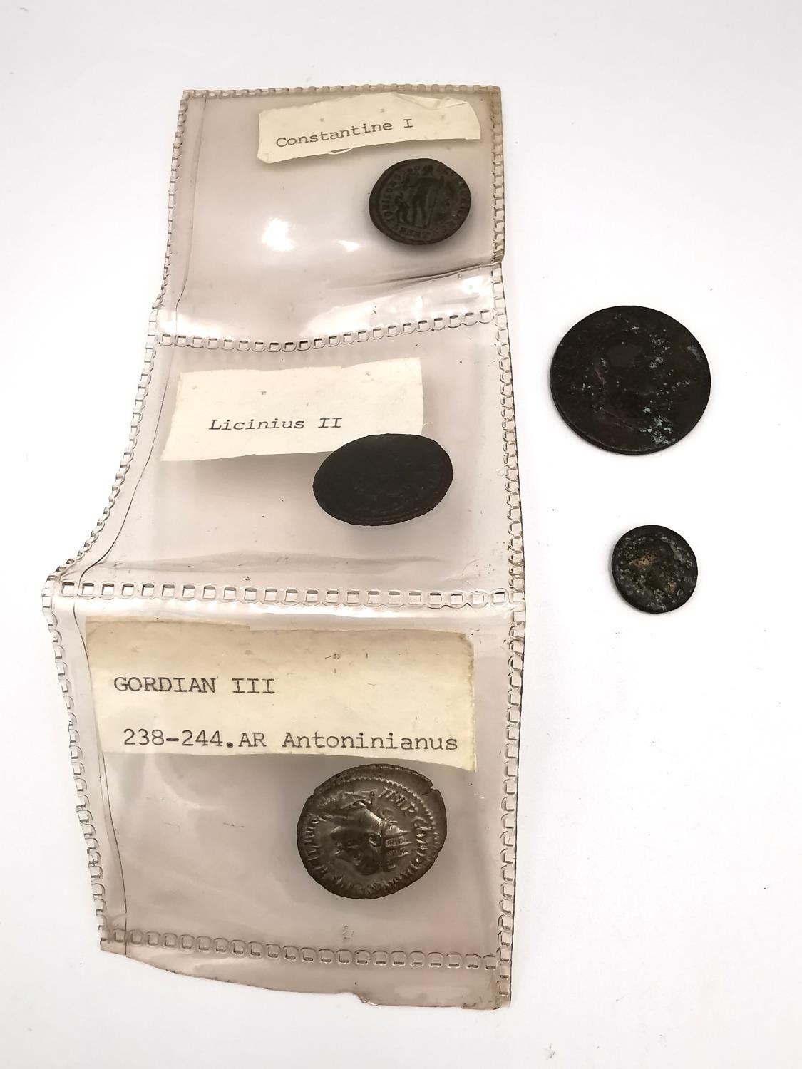 A colelction of five antique and Roman coins, including Licinius II, Constantine I and Gordian