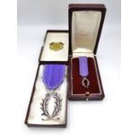 Two leather boxed 'Kretly Paris' French white metal medals with lilac ribbons, 'Chevalier Palmes