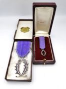 Two leather boxed 'Kretly Paris' French white metal medals with lilac ribbons, 'Chevalier Palmes